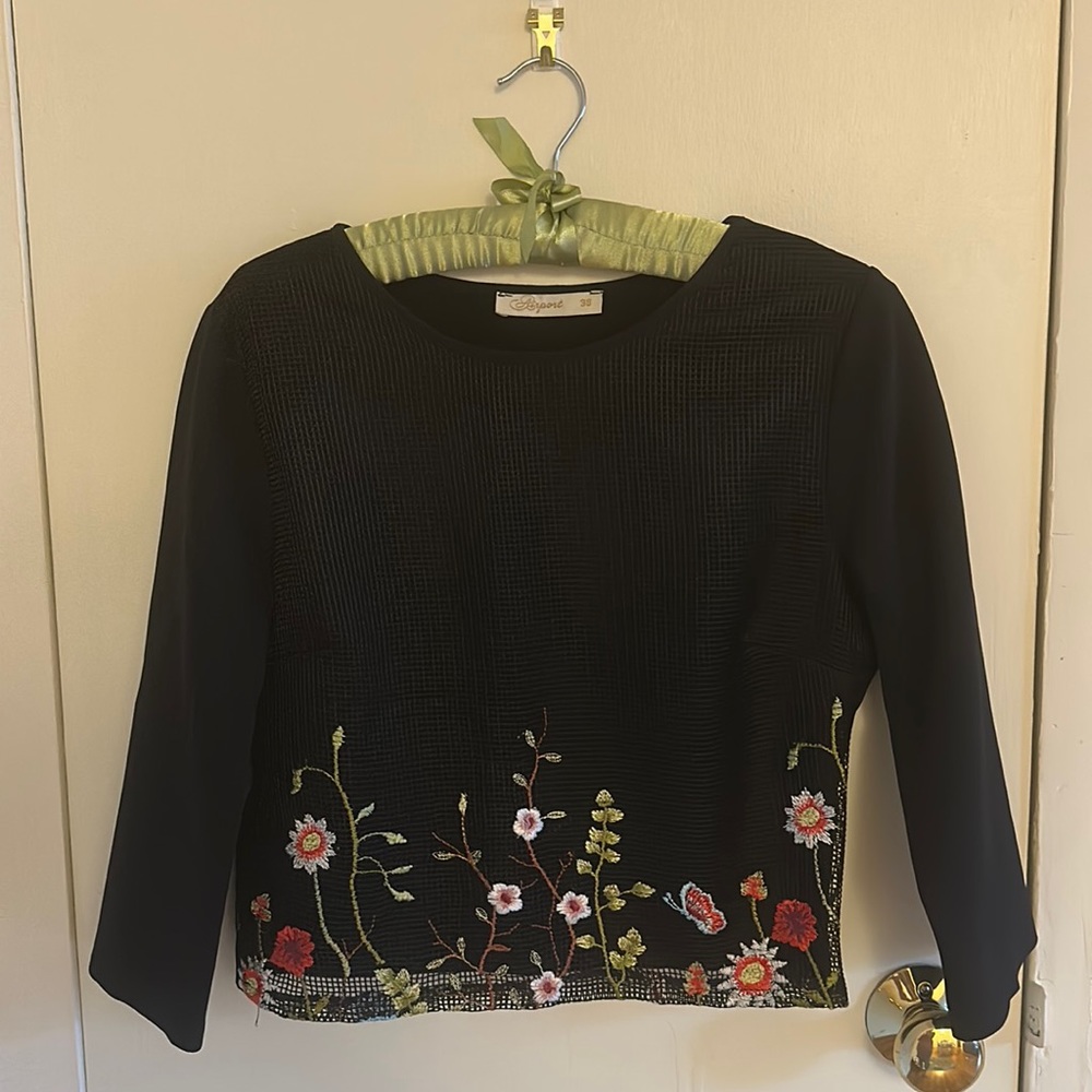Black blouse with embroidered flowers